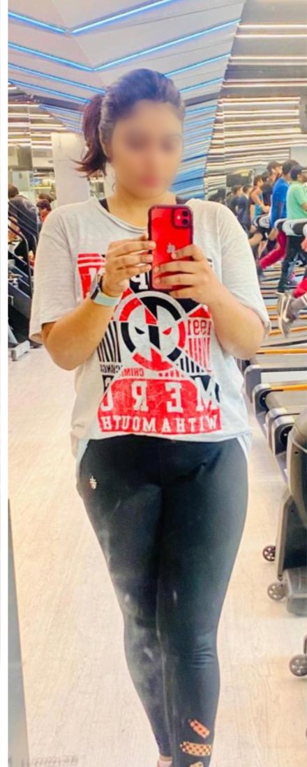 After photo from a client fitness transformation, face softly blurred for privacy