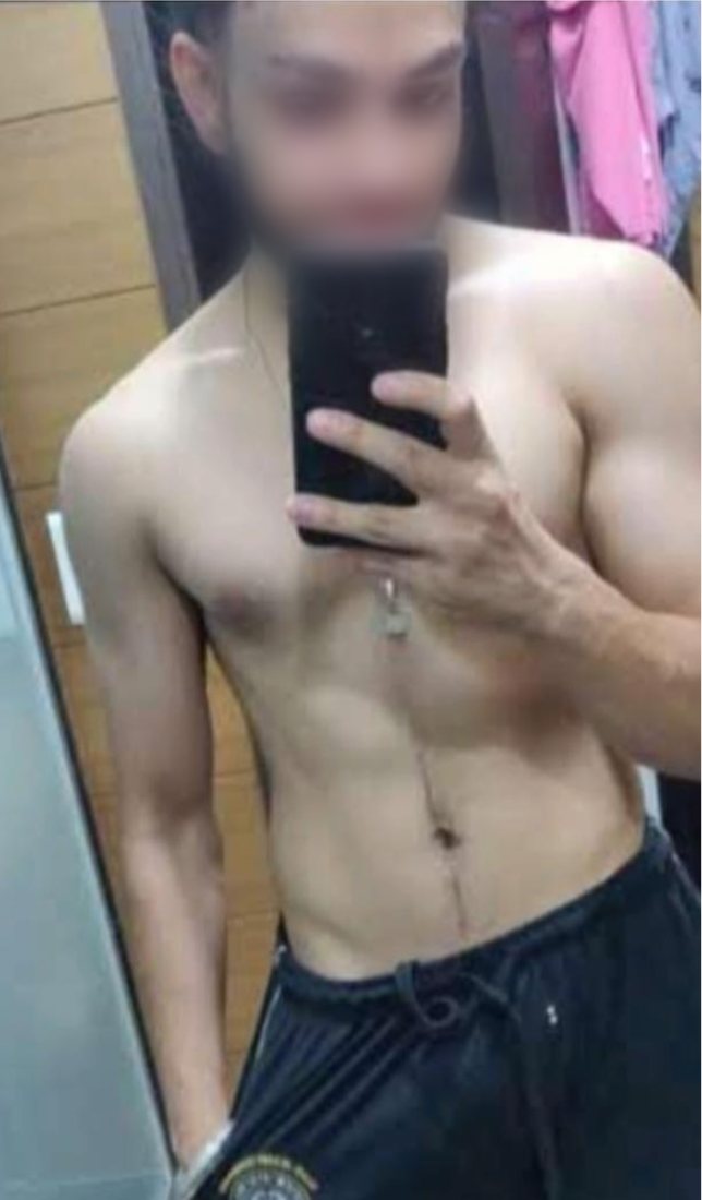 Before photo from a client fitness transformation, face softly blurred for privacy