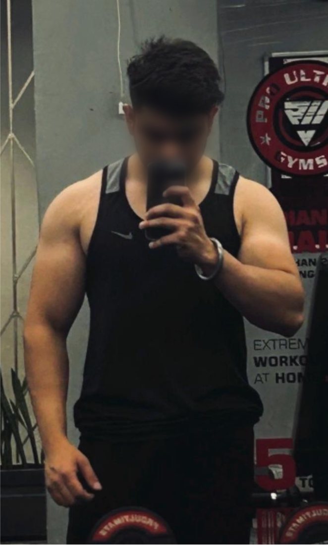 After photo from a client fitness transformation, face softly blurred for privacy